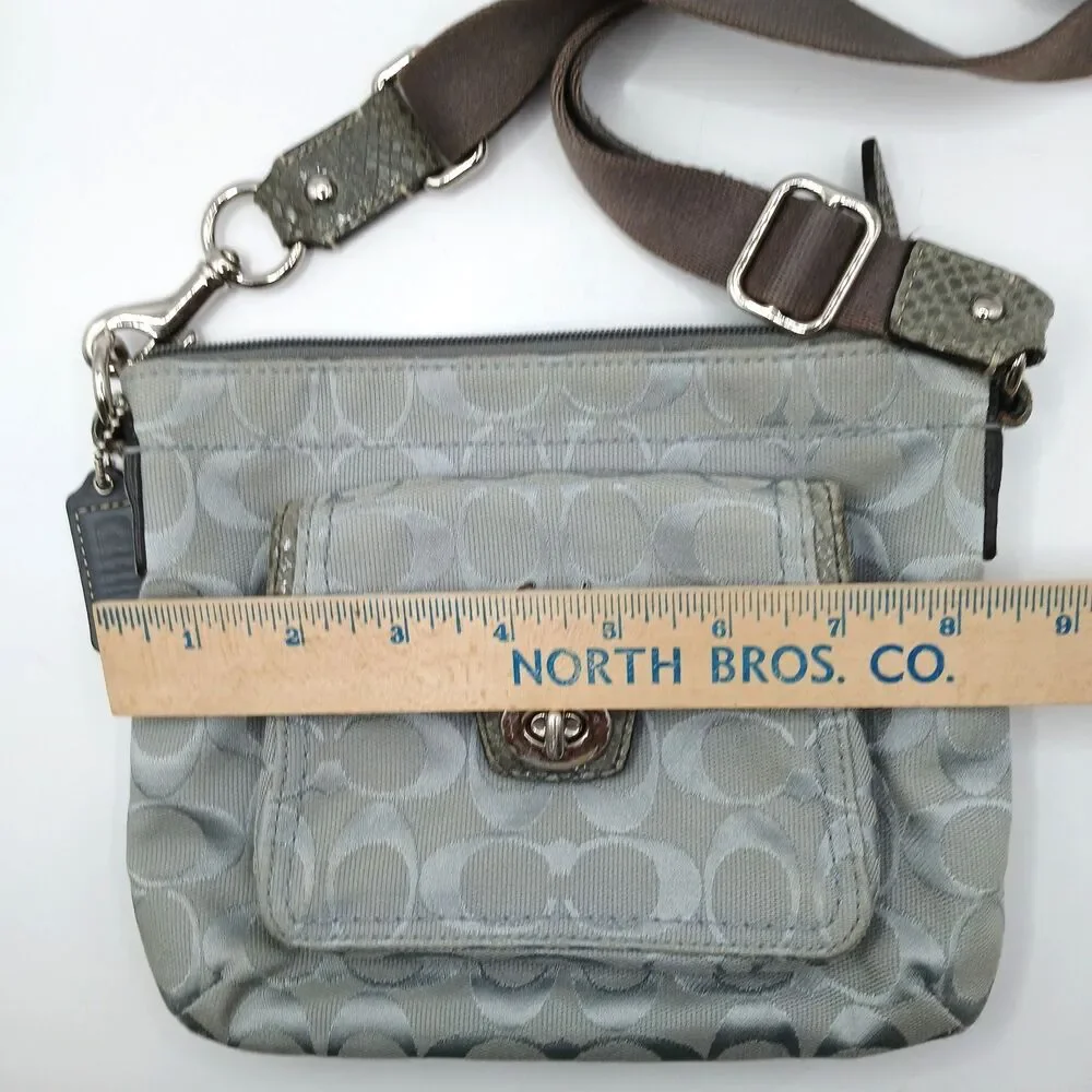 Coach Penelope Signature Turn-Lock Crossbody Bag in Silver With Lavender Lining